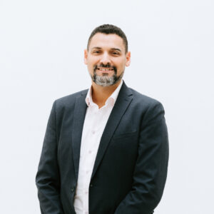 A portrait of Dr. Hatim Hemeda, CEO and Co-Founder of PL BioScience.