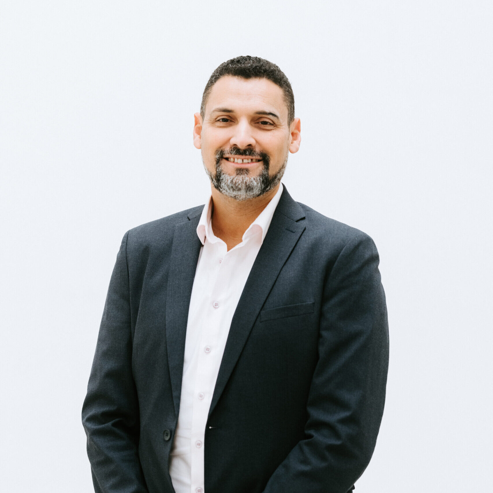 A portrait of Dr. Hatim Hemeda, CEO and Co-Founder of PL BioScience.
